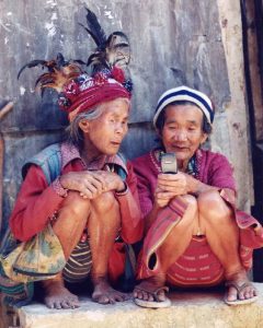 Image of two older women using a cellphone