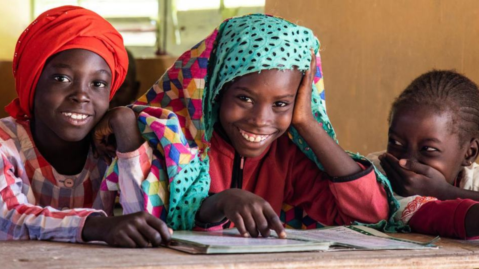 © UNICEF/Vincent Tremeau Girls study together at school in Senegal.