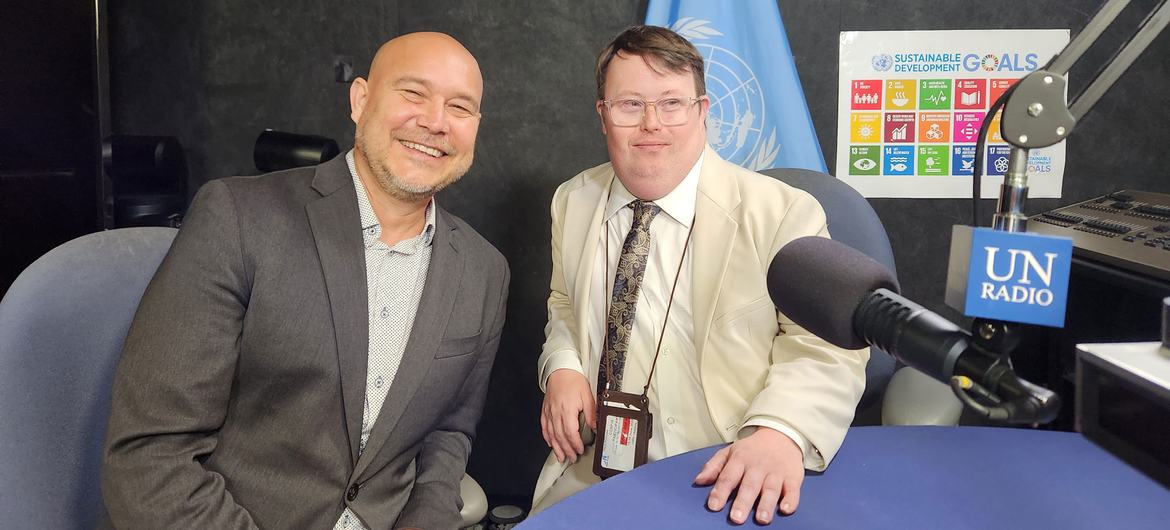 © L’Arche/Warren Pot | Nick Herd (right) and his colleague Warren Pot from L’Arche Canada are interviewed at the United Nations.