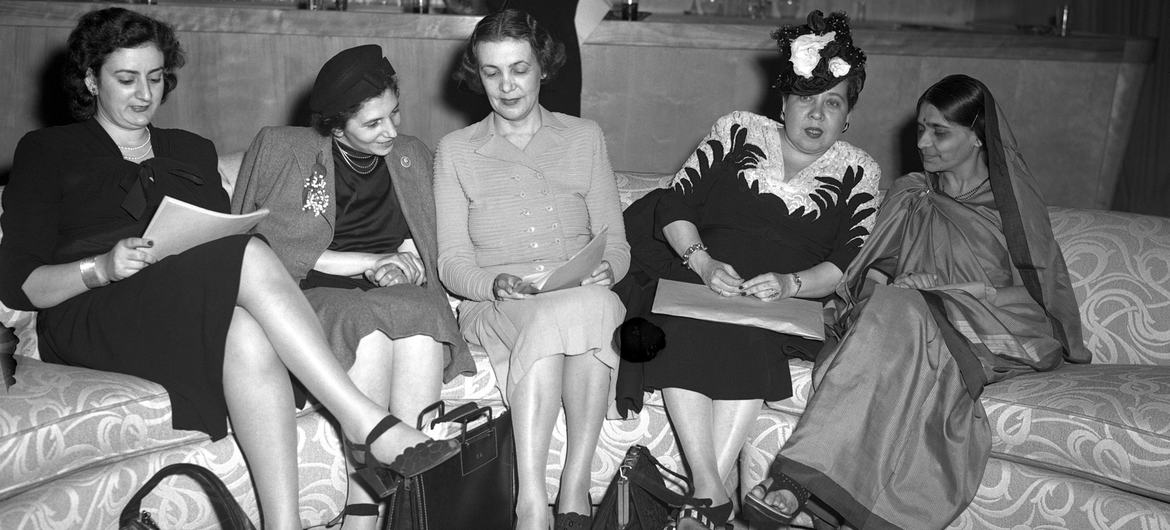 source: UN Photo Sub-commission on the Status of Women members, from Lebanon, Poland, Denmark, Dominican Republic and India, prepare for a press conference at Hunter College in New York on 14 May 1946. (file)