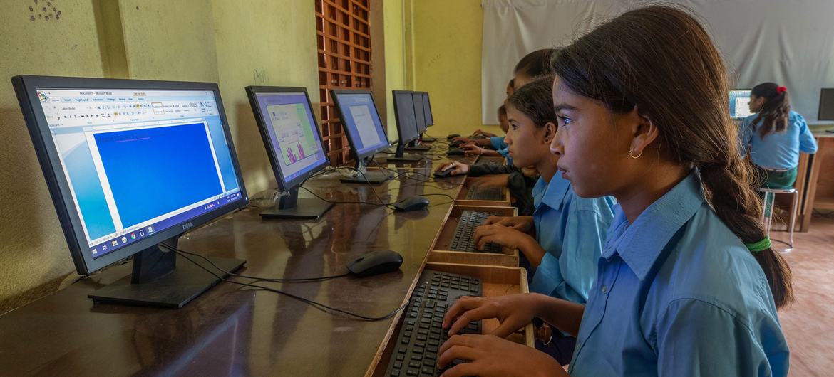 © ADB/Narendra Shrestha Students attend a computer class at a secondary school in Kailali, Nepal.
