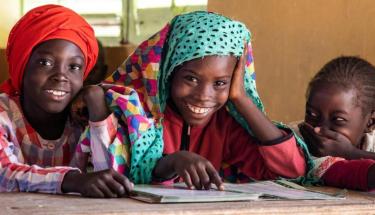 © UNICEF/Vincent Tremeau Girls study together at school in Senegal.