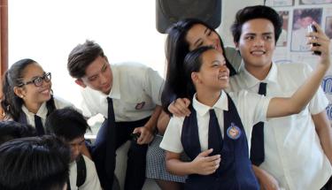 UNICEF/Joshua Estey Students in Cebu, Philippines take a selfie at school.