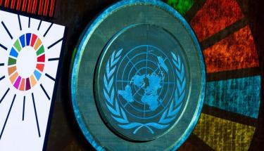 UN Photo/Cia Pak | A projection of the SDG logo in the General Assembly Hall